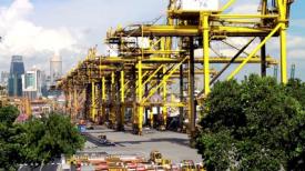 Attached Image: stock-footage-large-gantry-cranes-trucks-and-ship-containers-at-port-of-singapore-the-world-s-busiest.jpg